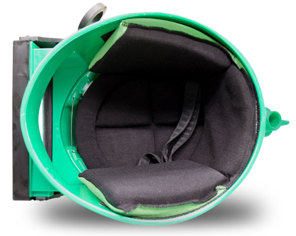 a green helmet with black inside