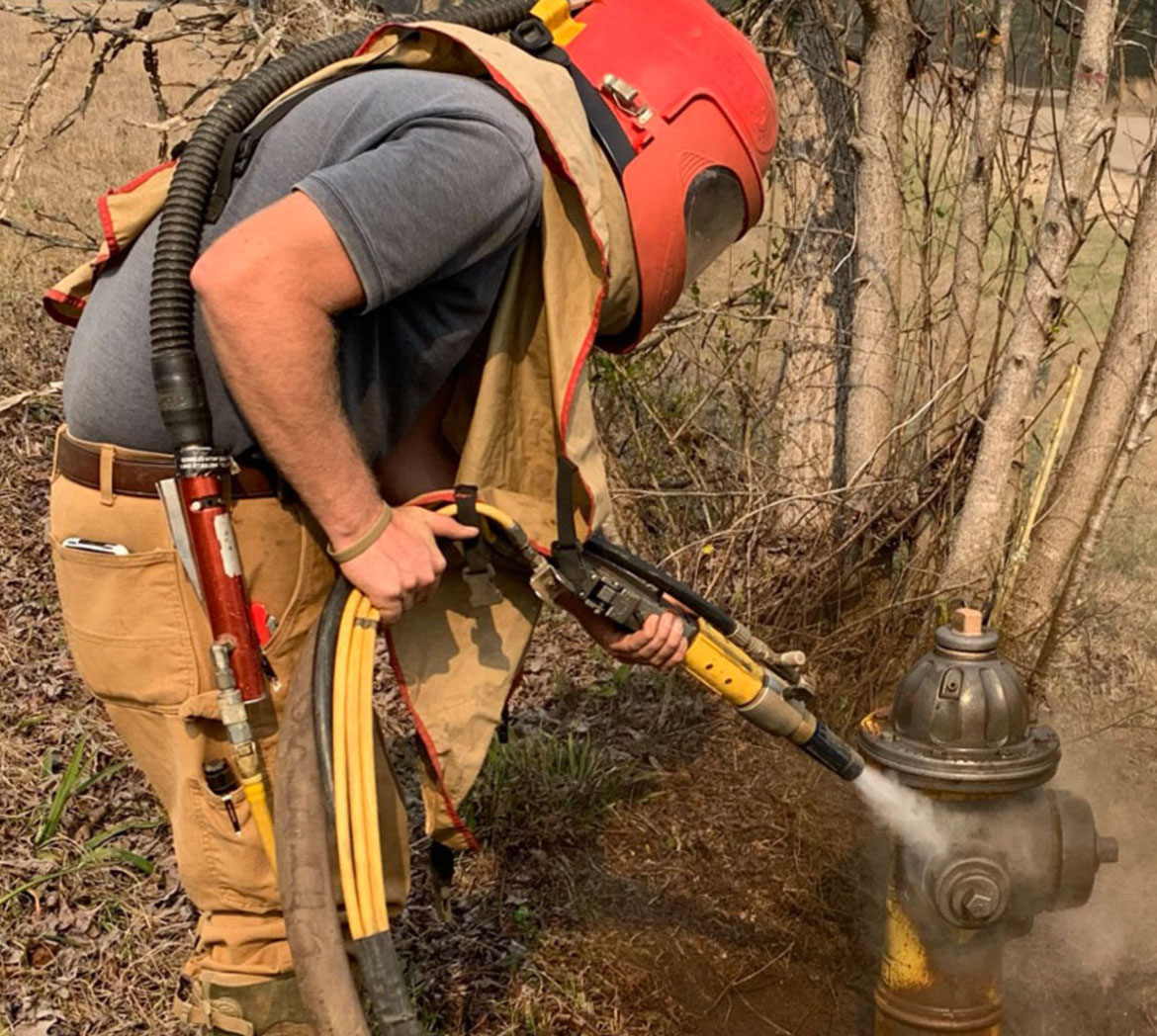 FLEX Wetblasting a Fire Hydrant